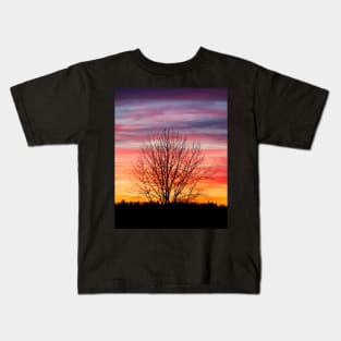 Tree silhouette and beautiful vibrant sunset clouds Kids T-Shirt